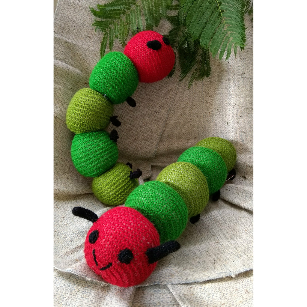 Hand-knitted caterpillar soft toy